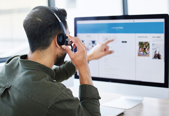 Call center, Customer support and man telemarketing consultant working on a computer screen for...