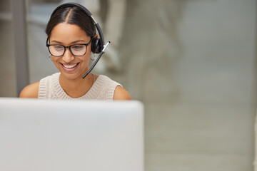 Business woman, call center and pc web support communication at a computer in a office. Phone conversation, smile and worker with contact us, crm and customer service job in a consulting agency