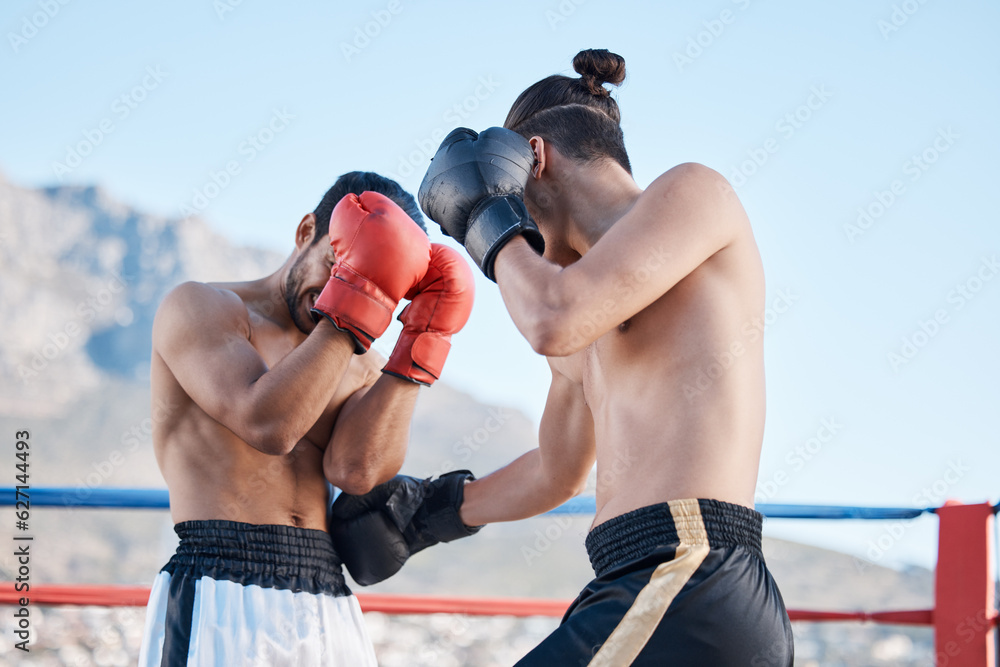 Wall mural Punch, boxing match or men fighting in sports training, exercise or fist punching with strong power. Fitness action, boxers or combat fighters boxing in practice workout in ring on rooftop in city