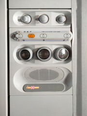 light switch and air conditioning on an airplane