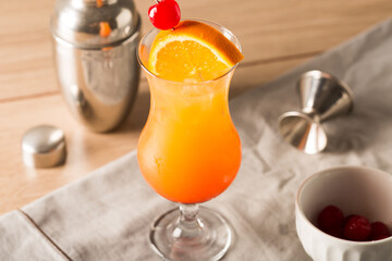 boozy Tequila Sunrise Cocktail tequila, fresh orange juice,  fresh lime juice and grenadine