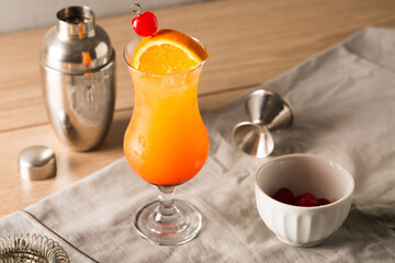 boozy Tequila Sunrise Cocktail tequila, fresh orange juice,  fresh lime juice and grenadine