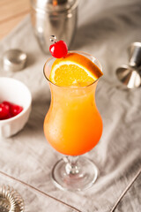 boozy Tequila Sunrise Cocktail tequila, fresh orange juice,  fresh lime juice and grenadine