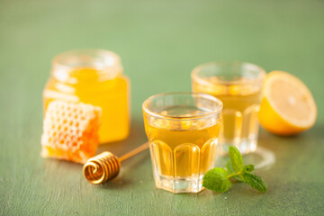 Mead, alcoholic honey strong drink. Alcoholic tincture with honey and lemon