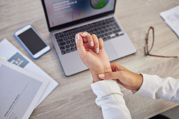 Hands, business woman and pain in wrist from typing on laptop, orthopedic injury or health risk from above. Closeup of worker, carpal tunnel and muscle problem from stress, fibromyalgia and arthritis