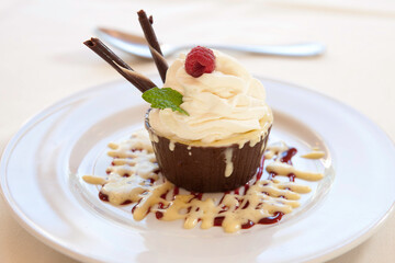 Vanilla ice cream in chocolate cup