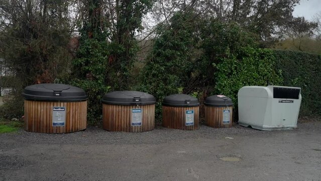 Row of separate garbage containers for a durable environmental world