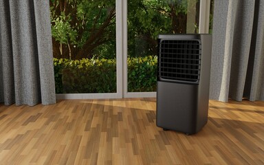 Black portable air condicioner against a large window in a room with wooden flooring
