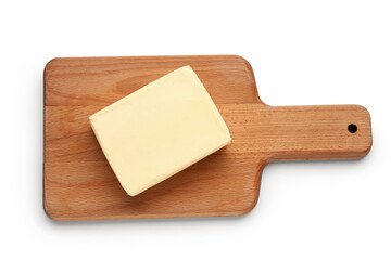 Wooden board with fresh butter on white background