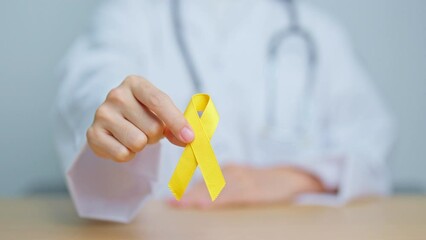 Yellow September, Suicide prevention day, Childhood, Sarcoma, bone and bladder cancer Awareness month, Yellow Ribbon for supporting people life and illness. Healthcare and World cancer day concept