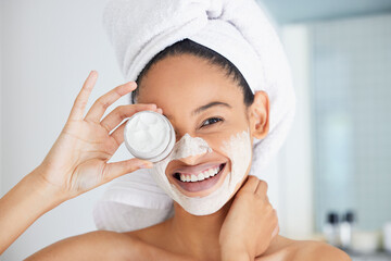 Portrait, happy woman and towel with mask, jar and skincare product in bathroom for face, cosmetics...