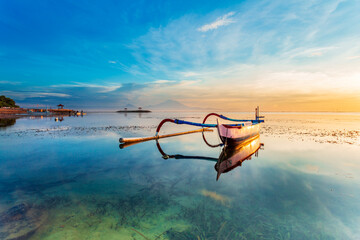 Morning in Bali, Indonesia. Traditional fishing boats at Sanur beach, Bali, Indonesia. - 627153056