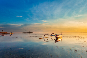 Morning in Bali, Indonesia. Traditional fishing boats at Sanur beach, Bali, Indonesia. - 627153060