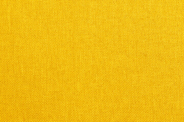 Yellow linen fabric cloth texture background, seamless pattern of natural textile.