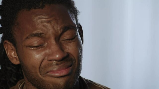 Distraught African Man in Dreadlocks Breaks Down in Tears