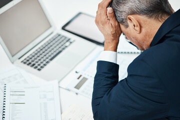 Headache, laptop and business man stress in financial crisis, report or stock market crash of...