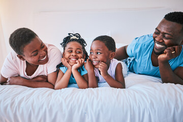 Smile, bond and black family in bed happy, talking and relax in their home on weekend. Love, face...