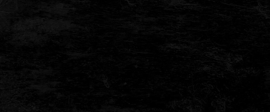 Black wood texture with natural pattern, black dark wooden background, wooden structural black background. Top view. Free space.