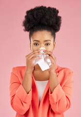 Woman, tissue and sneeze in studio portrait for healthcare, hygiene and allergy by pink background. African gen z girl, sick student or model with toilet paper, blowing nose or cleaning for self care