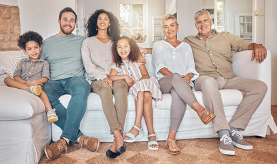 Happy big family, portrait and relax on sofa together for holiday weekend or bonding at home. Interracial parents, grandparents and kids smile in happiness for quality time on couch in living room