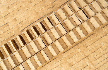 Corrugated Cardboard Edge Layers Textured Background. Carton Cut Slices Pattern with Copy Space