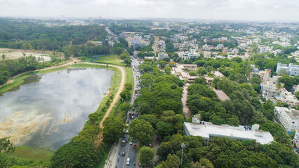 Bangalore, India 24th March 2022: An aerial shot of Bangalore city with live traffic and lake. The capital city of Karnataka drone view. The megacity of India. Cosmopolitan city. Indira nagar.