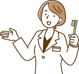 歯ブラシを持ってアドバイスする女性の歯科医