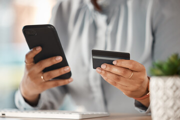 Woman, credit card and hands with phone in office for finance, business accounting and banking password. Closeup of worker, mobile money and internet payment for online shopping, fintech and trading