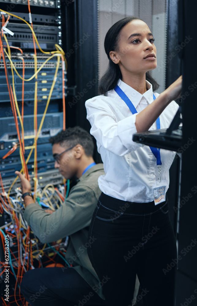 Poster Server room, engineer or IT team working together for programming, cybersecurity or maintenance. African woman and man technician in datacenter for network, software and server or system upgrade