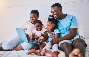 Laptop, black family and relax in a bed with movies, games and streaming in their home. Online,...