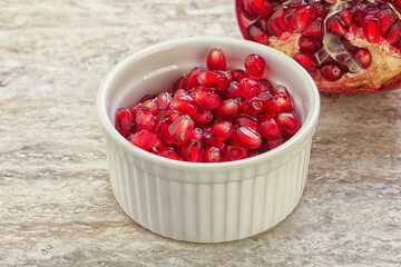 Ripe red Pomegranate seeds in the bowl