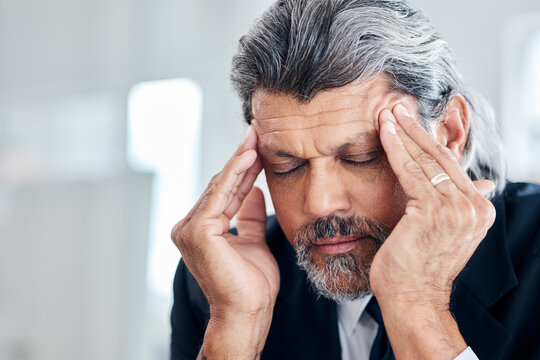Headache, face and senior business man with depression, corporate mistake or mental health crisis. Office anxiety, migraine pain and professional elderly person stress, problem and overwhelmed