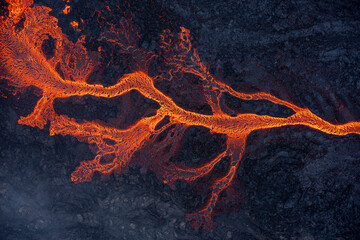 Aerial view of spreading melted lava from volcano.