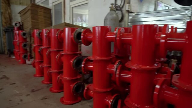 Manufactured Red Details Of Fire Hydrant At Pipe Production Factory. Manufacturing Firefighting Equipment. Fire Hydrant Parts. Fire Hydrant Manufacturing Fire Protection. Industrial Plant