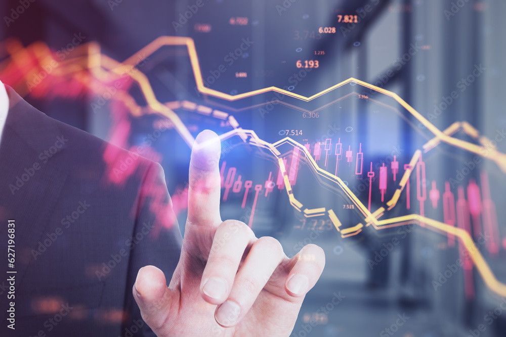 Poster close up of businessman hand pointing at falling forex chart with index on blurry office interior ba