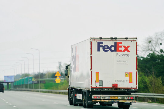 Germany, Europe - April 26, 2023: FedEx Ground truck driving on the highway
