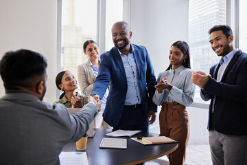 Meeting, smile and handshake with welcome, business people in office and b2b deal or agreement at...