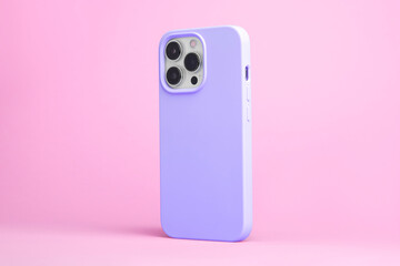 smart phone in purple case back side view isolated on pink background, iPhone 15 Pro case mock up