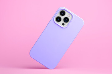 smart phone in purple soft silicone case falls down back view, iPhone 15 and 14 Pro Max case mockup isolated on pink background