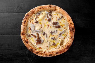 Top view of pizza with cheese sauce and fried forest mushrooms
