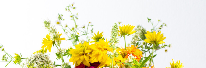 Summer bouquet of colorful Zinnia, onion inflorescences and mint sprigs, Rudbeckia Goldquelle and red clover, Ranunculus and Matricaria, home decoration with flowers banner