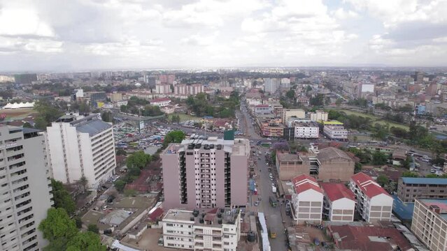 Aerial drone footage of moving traffic in  Nairobi city Ngara figtree junction