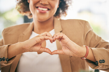 Hands, heart and business woman with love emoji for care, kindness and like in office. Closeup of...