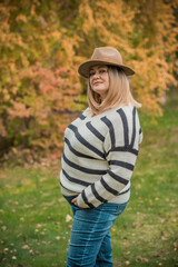 Plus size European mature woman at warm clothes. Life of people xxl size, older natural beauty woman. Concept of body positive