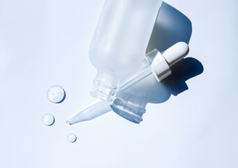 pipette drop of serum test on gray background - obrazy, fototapety, plakaty