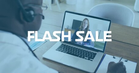 Animation of flash sale text over african american senior male doctor having a videocall on laptop - Powered by Adobe