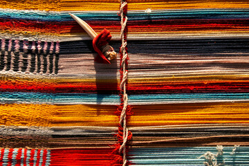 Material and tools for the elaboration of textile handicrafts in an indigenous community of Lake Titicaca, Peru. - obrazy, fototapety, plakaty