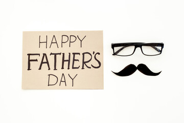 Happy Fathers day greeting card with mustache, top view