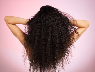 Hair, beauty and back of woman with hairstyle transformation and curly texture. Model, salon...