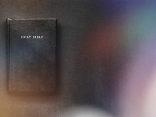 Holy Bible on the black background